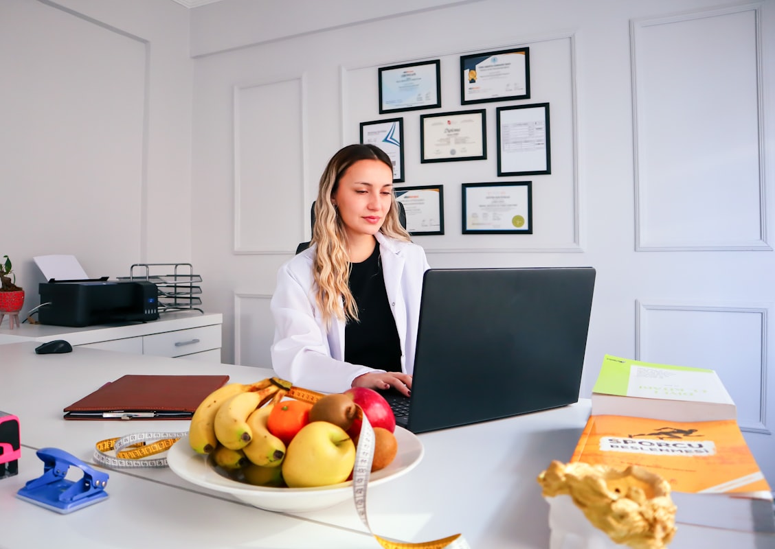Nutrition coach working with client in consultation